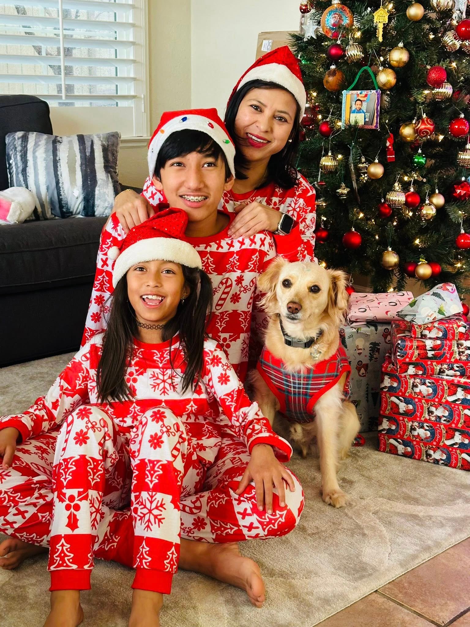 Miss Rasu with her children and Fluffy